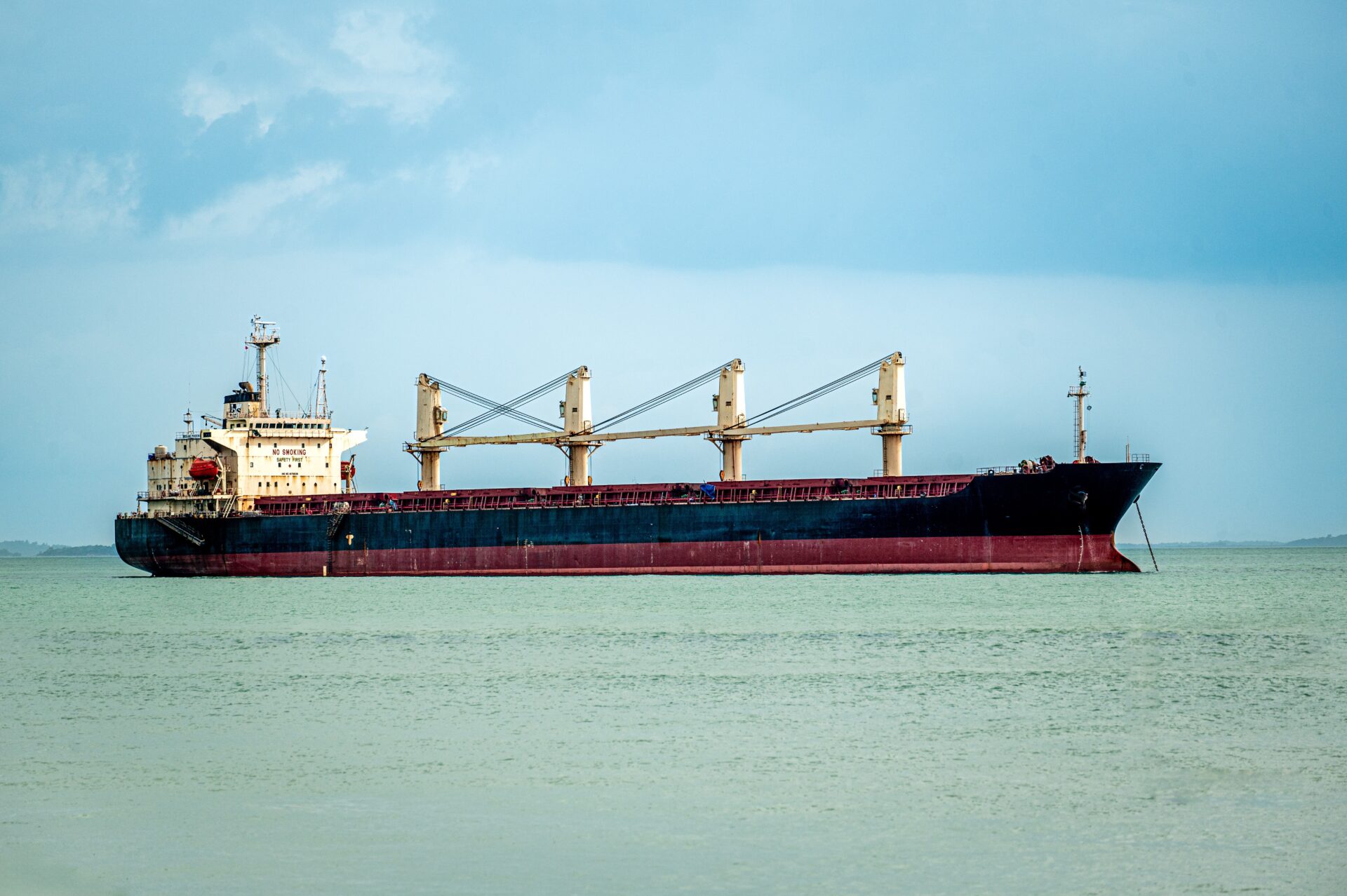 An oil tanker sailing through Red Sea along coast of Yemen. transportation of goods important for global economy by sea.